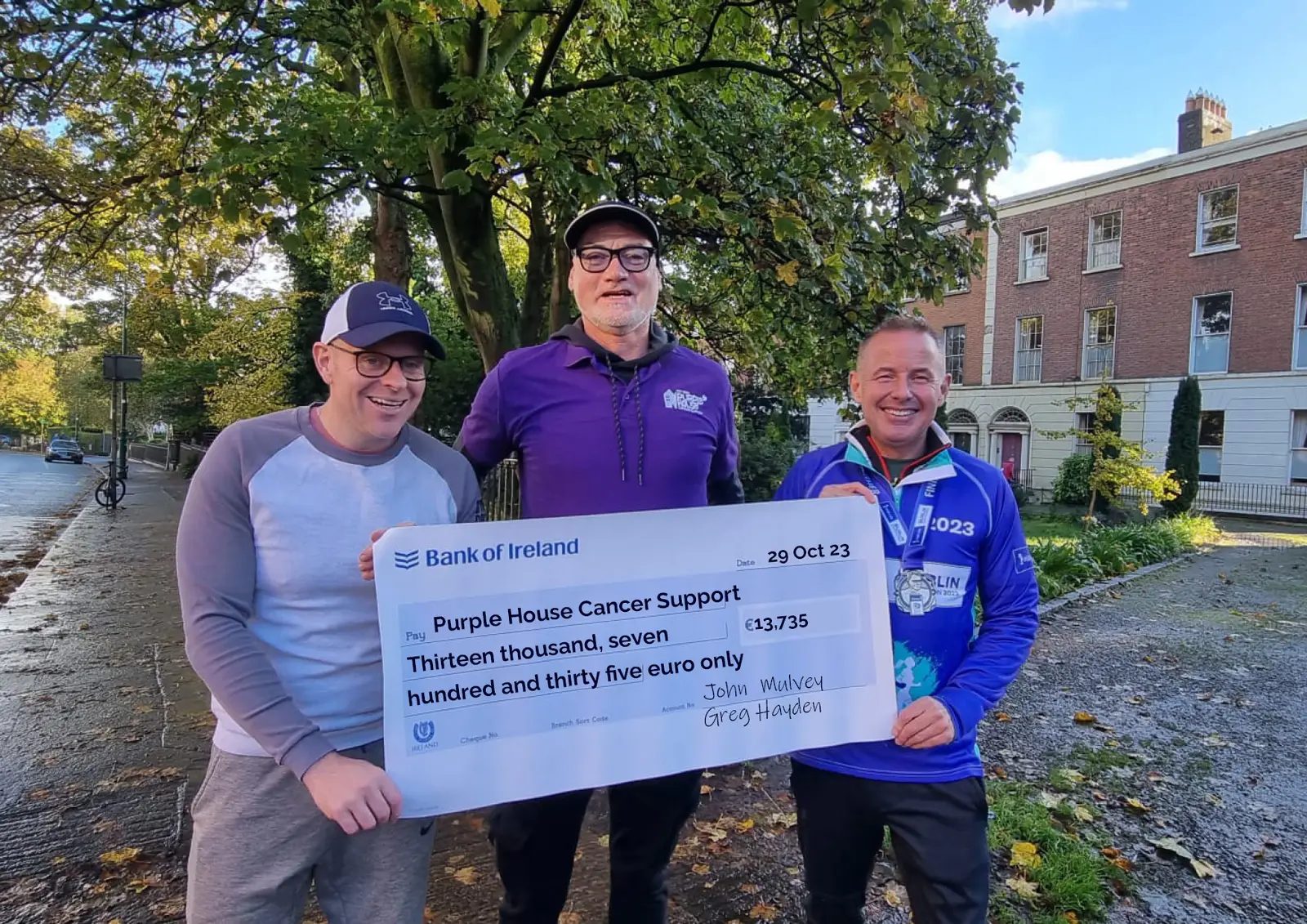 Pictured Left to Right: John Mulvey (Director, Fusion 4 Quality), Tom Doyle (Purple House Cancer Support), and Greg Hayden (CEO, Ethos Engineering) with the cheque after the Dublin Marathon